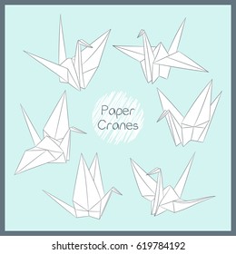 Set of paper cranes. Origami bird figure. Japanese symbol of happiness and joy