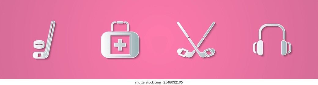 Set paper cut Ice hockey stick and puck, First aid kit, sticks and Winter headphones icon. Paper art style. Vector