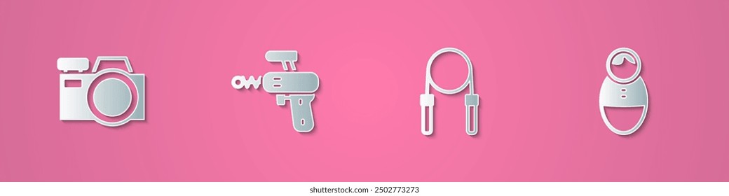 Set paper cut Photo camera, Ray gun, Jump rope and Tumbler doll toy icon. Paper art style. Vector