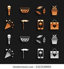 Set Paper mustache on stick, Cake, Shopping bag with heart, Mobile birthday message, Festive confetti, Candy, Karaoke microphone and Mixed punch bowl icon. Vector