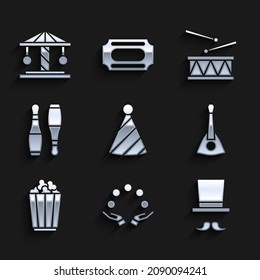 Set Party hat, Juggling ball, Magician, Balalaika, Popcorn box, Bowling pin, Drum with drum sticks and Attraction carousel icon. Vector