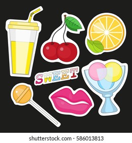 set of patches with fruit on black background