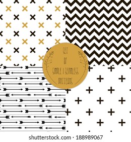 Set of  patterns. Set of simple seamless 4 black and white Scandinavian trend seamless pattern - black cross, chevrons, stripes, arrow.