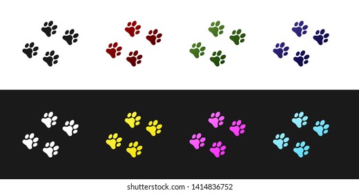 Set Paw print icon isolated on black and white background. Dog or cat paw print. Animal track. Vector Illustration