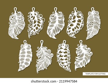 Set of pendants in the shape of leaf, feather. Beautiful hanging decoration, ornaments with lace pattern. Vector template for cnc, plotter laser cutting of jewelry, key chains, accessories, bijouterie