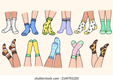 Set of people legs in colorful funny socks. Collection of woman feet in multicolored footgear. Fashion and sale in retail. Advertising concept. Flat vector illustration. 