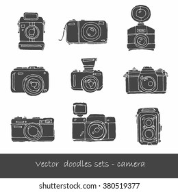 Set of Photo Camera - hand-drawn doodles in vector - vector illustration