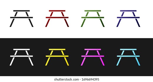 Set Picnic table with benches on either side of the table icon isolated on black and white background. Vector Illustration