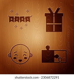 Set Piece of puzzle, Carnival garland with flags, Happy little boy head and Gift box on wooden background. Vector
