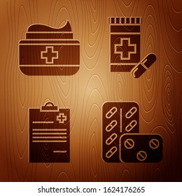 Set Pills in blister pack, Ointment cream tube medicine, Medical clipboard with clinical record and Medicine bottle and pills on wooden background. Vector