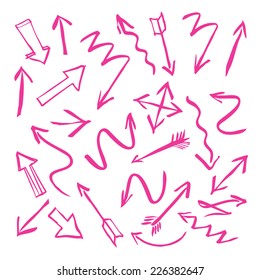 A set of pink arrows drawn with a brush. Useful graphic elements for presentations. Isolated Vector Graphics.