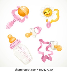 Set of pink items for the baby bottle, pacifier, rattle, toy isolated on white background