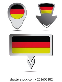a set of pins with the german flag