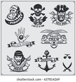 Set of pirate labels, emblems, badges and design elements.