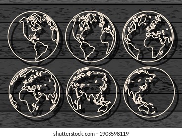 
set of planet earth icons on a dark background. Wood background