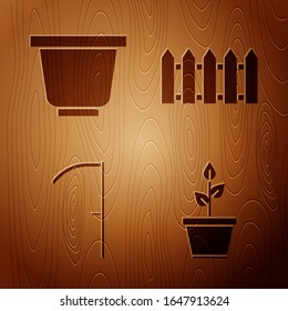 Set Plant in pot, Flower pot, Scythe and Garden fence wooden on wooden background. Vector