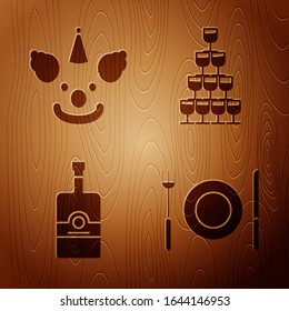 Set Plate, fork and knife , Clown head , Whiskey bottle  and Wine glasses stacked in a pyramid tower  on wooden background. Vector