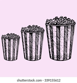 set popcorn in cardboard box for cinema, doodle style, sketch illustration, hand drawn, vector