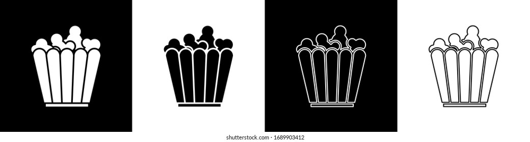 Set Popcorn in cardboard box icon isolated on black and white background. Popcorn bucket box.  Vector Illustration