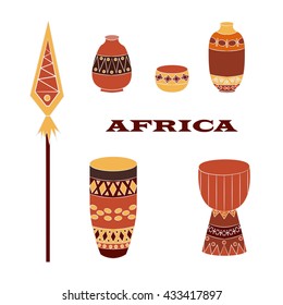 Set of popular African items:decorative pitchers, drums, voodoo spear with ornaments and folkloric elements. Vector set with african motives. Safari or Jungle background for  banners, flayers.
