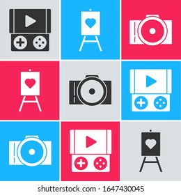 Set Portable video game console, Wood easel or painting art boards and Photo camera icon. Vector