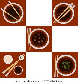Set of portion variations of miso soup and sushi stand full with rolls.