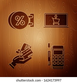 Set Pos terminal with inserted credit card, Signboard hanging with an inscription discount percent, Human hand holding with credit card and Shopping cart on screen laptop on wooden background. Vector