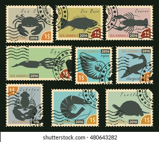 set of postage stamps with silhouettes of sea animals
