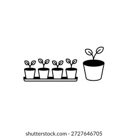 Un conjunto de plantas en maceta en una bandeja y una maceta separada