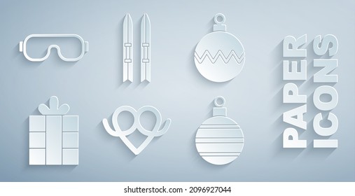Set Pretzel, Christmas ball, Gift box, Ski and sticks and goggles icon. Vector
