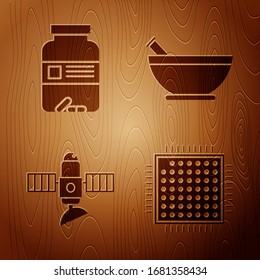Set Processor, Medicine bottle and pills, Satellite and Mortar and pestle on wooden background. Vector