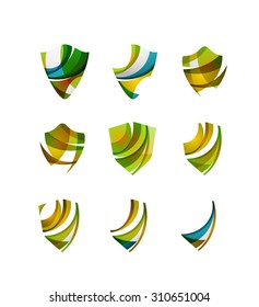 Set of protection shield logo concepts. Color flowing wave design icons on white