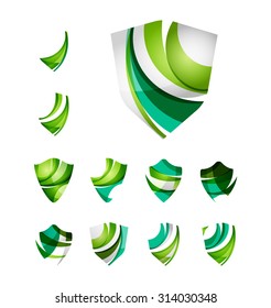 Set of protection shield logo concepts. Color flowing wave design icons on white