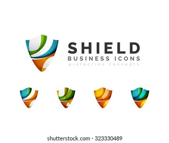 Set of protection shield logo concepts. Color flowing wave design icons on white