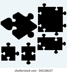 Set puzzles, jigsaw icon. Isolated on blue background. Vector silhouettes
