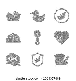 Set Rattle baby toy, Baby on shield, Sand in bucket with shovel, inside heart, Speech bubble mom, hat,  and bathtub icon. Vector