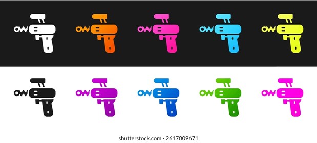 Set Ray gun icon isolated on black and white background. Laser weapon. Space blaster.  Vector