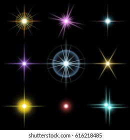 Set of the realistic beautiful multicolored star fires and flashes on a black background a vector illustration. Blue, red, yellow, pink, violet stars.