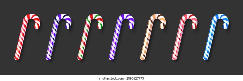 Set of realistic colorful candy canes. Black background. Vector holiday illustration.