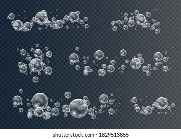 Set of realistic colorful soap bubbles to create a design. Transparent realistic soap bubbles isolated on transparent background.