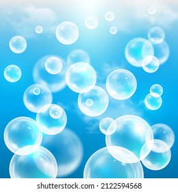 Set of realistic colorful underwater bubbles of the depths of the sea, ocean. Transparent realistic water bubbles on a blue background. Vector illustration.