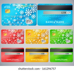 Set of realistic credit card two sides. Vector illustration for your business winter holiday design. With white snow flakes. Blue, red, green and yellow colors. New Year and Christmas theme.