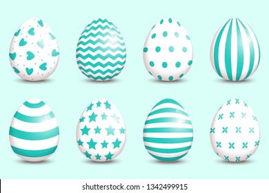 Set of realistic easter decorated eggs on turquoise background.