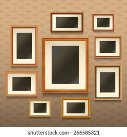 Set of realistic empty picture frames on wall with textured wallpaper vector illustration