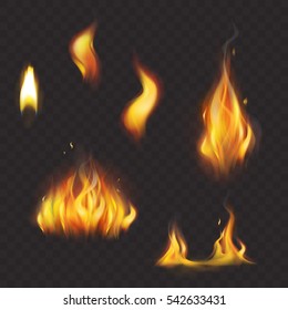Set of realistic flame tongues isolated on a dark background.