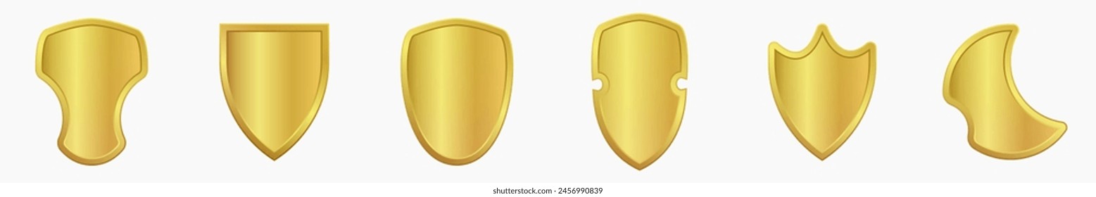 Set of realistic golden heraldic shields. Glass and glossy shield collection. Vector illustration.