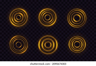 Set of realistic golden shiny rings or swirl, round frames of flare trail with glitter dust. Golden rings.