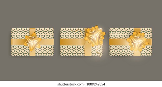 Set of Realistic green gift boxes with hearts pattern, gold ribbons and bow. Actual colors. View from above. Vector illustration.