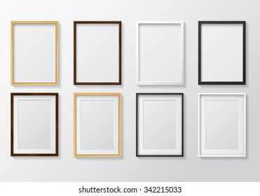 Set of Realistic Light Wood Blank Picture Frames and Dark Wood Blank Picture Frames, hanging on a White Wall from the Front. 
White and Black Blank Picture Frames. 
Design Template for Mock Up.