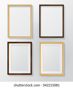 Set of Realistic Light Wood Blank Picture Frames and Dark Wood Blank Picture Frames, hanging on a White Wall from the Front. 
White and Black Blank Picture Frames. 
Design Template for Mock Up.